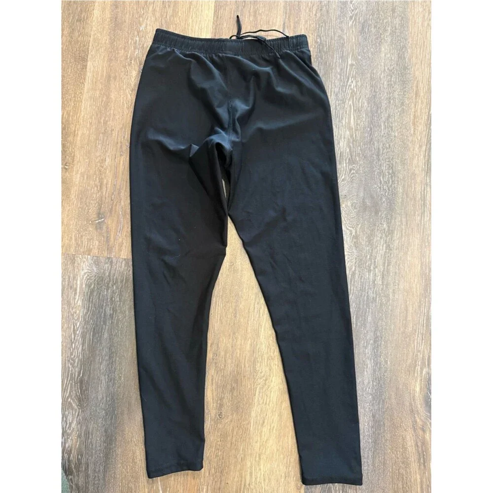 Nike womens small Black Track Joggers with White Swoosh
